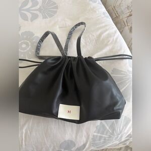 Carolina Herrera Black Drawstring Shoulder Bag with White Logo Patch